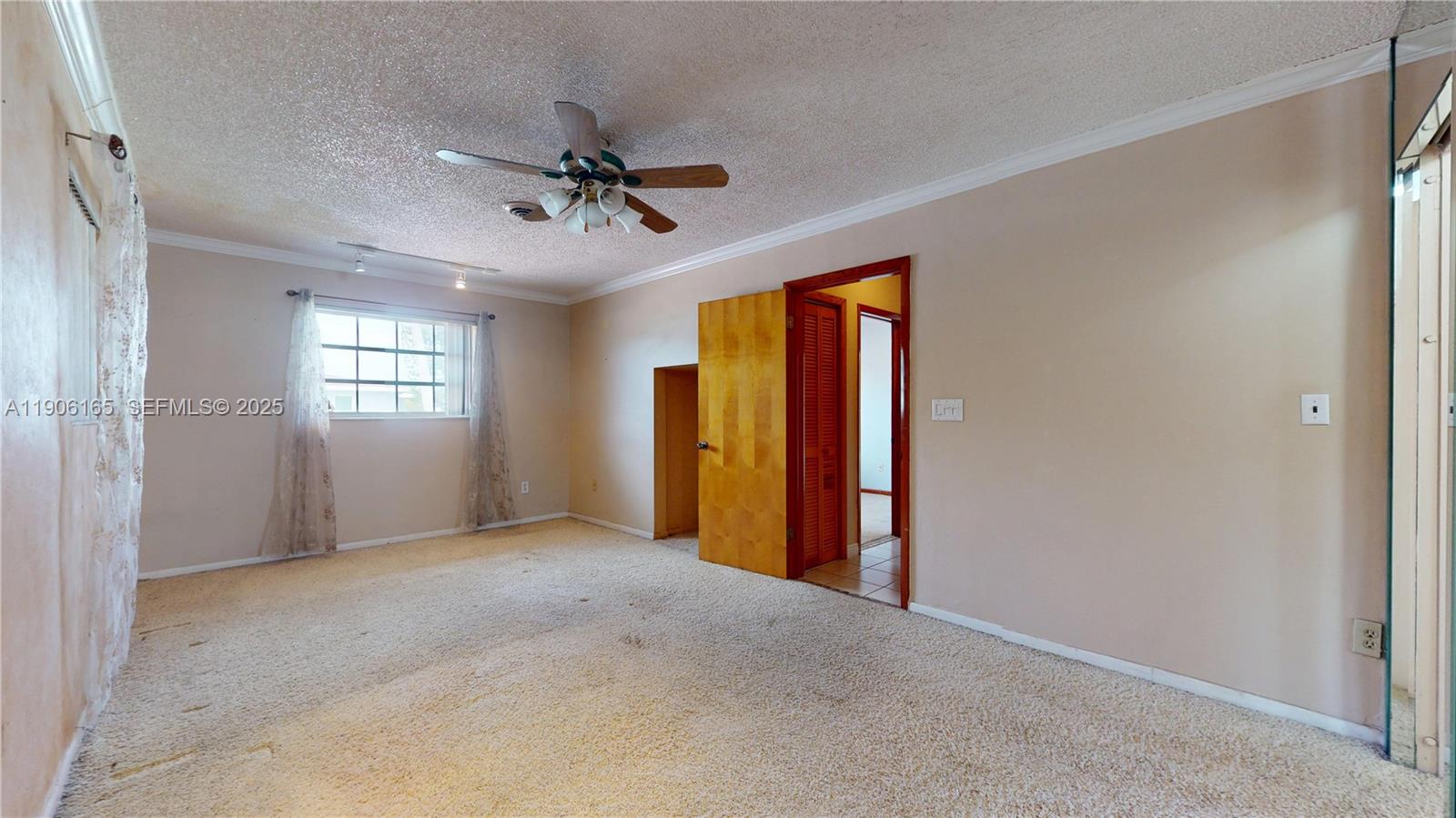 6051 Southwest 110th Avenue Miami, FL 33173 - Photo 23 of 49 a view of empty room with window