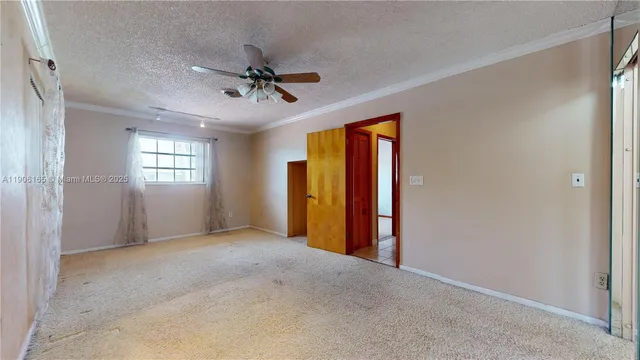 a bathroom with a granite countertop sink a mirror and a bathtub
