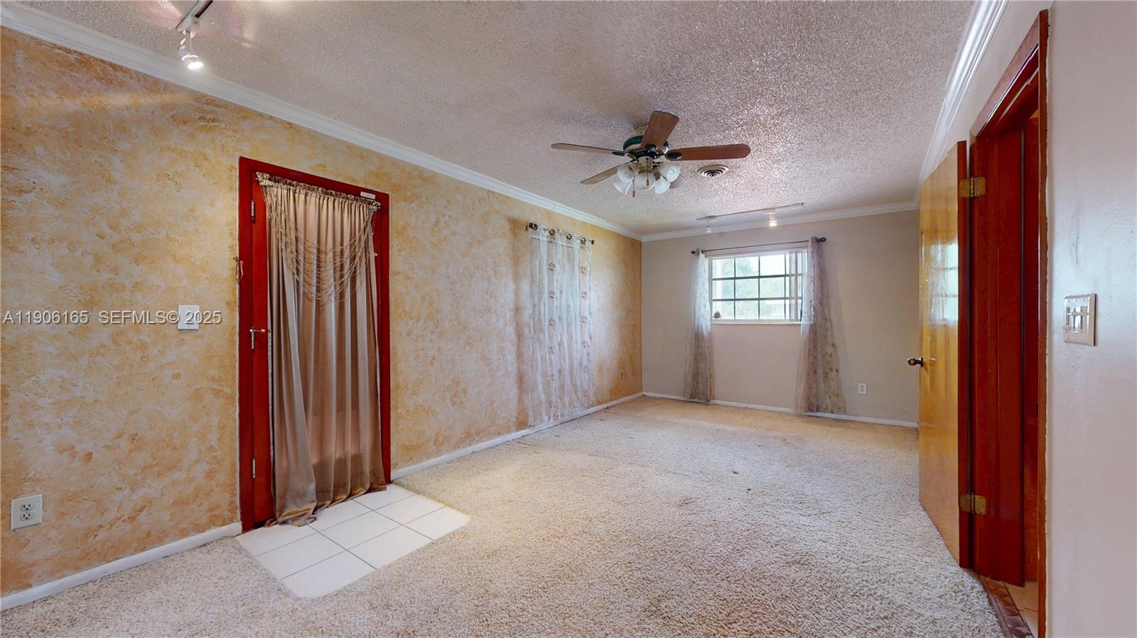 6051 Southwest 110th Avenue Miami, FL 33173 - Photo 24 of 49 a view of an empty room with a window