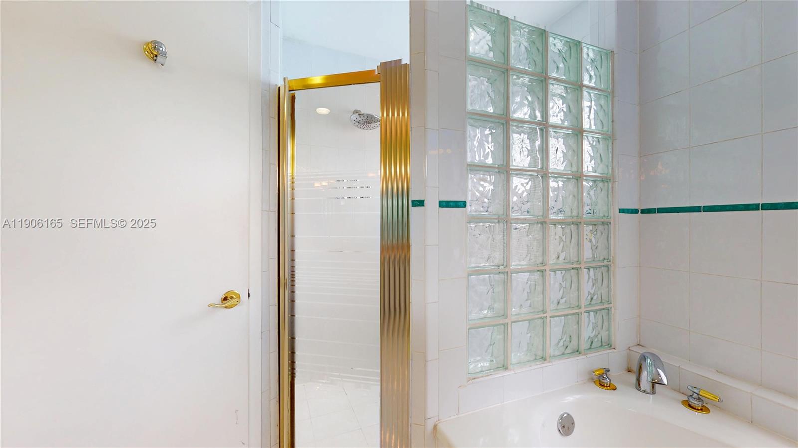 6051 Southwest 110th Avenue Miami, FL 33173 - Photo 28 of 49 a bathroom with a sink and a shower