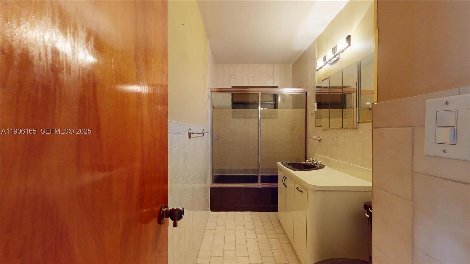 6051 Southwest 110th Avenue Miami, FL 33173 - Photo 35 of 49 a bathroom with a shower