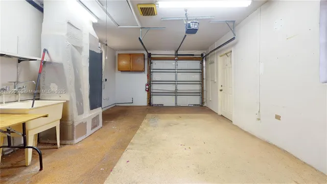 a view of swimming pool with a backyard