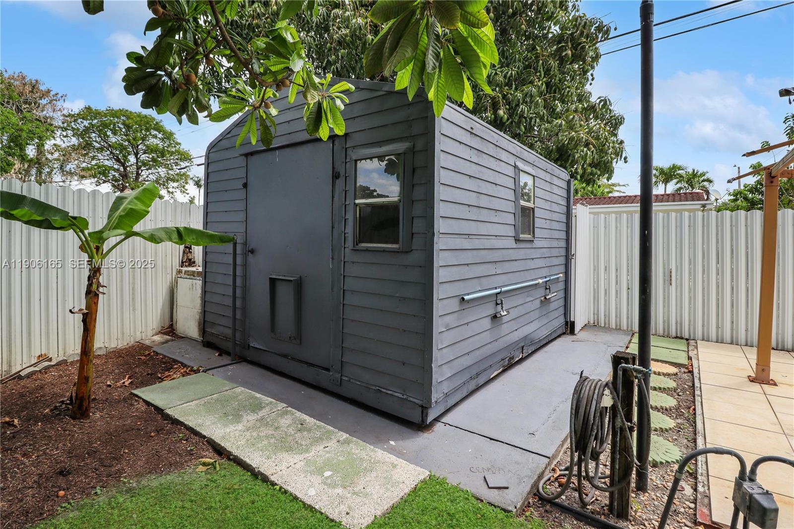 6051 Southwest 110th Avenue Miami, FL 33173 - Photo 48 of 49 a view of a backyard