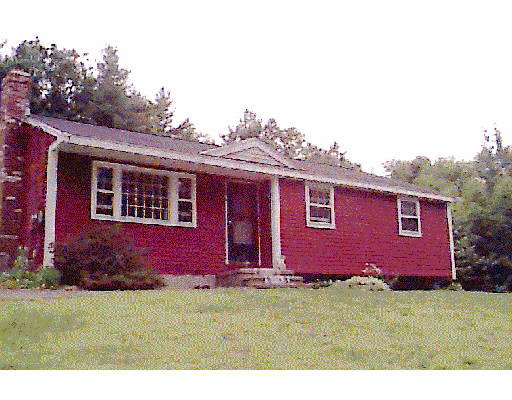 1798 Shirley Road Lancaster, MA 01523 - Photo 1 of 1 a front view of a house with a yard