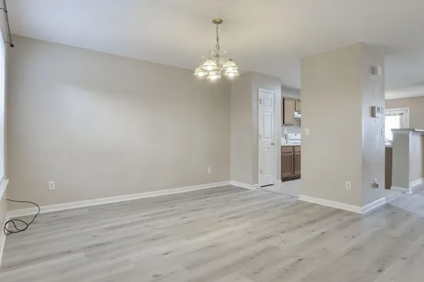 a view of a chandelier in an empty room
