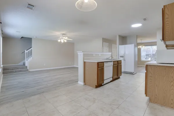 a view of a kitchen with a sink cabinets and a kitchen