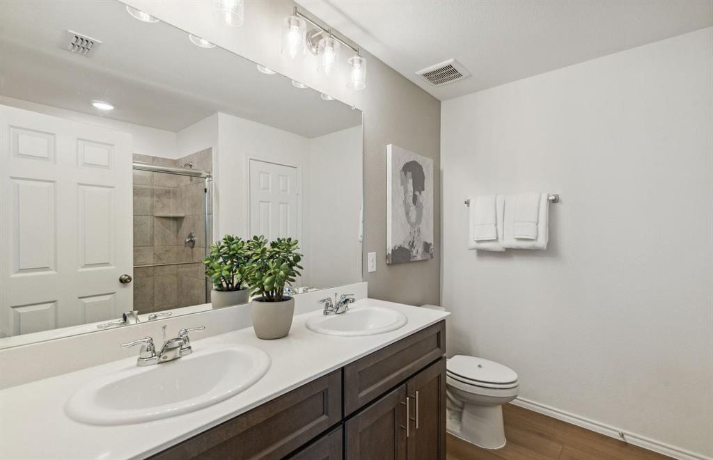 1136 Loch Way Princeton, TX 75407 - Photo 13 of 17 Spacious secondary bathroom *model representation