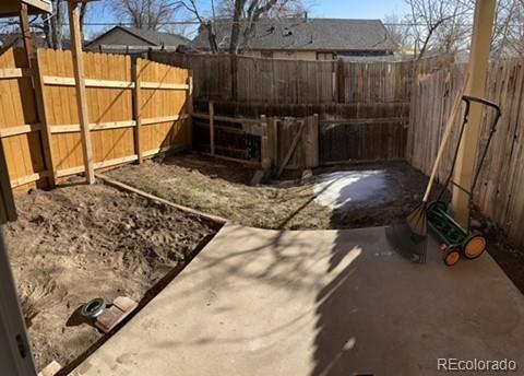 1976 Eagle Street Aurora, CO 80011 - Photo 11 of 14 a view of a backyard