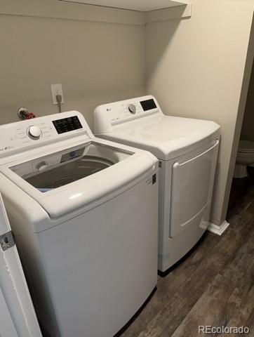 1976 Eagle Street Aurora, CO 80011 - Photo 12 of 14 a utility room with dryer and washer