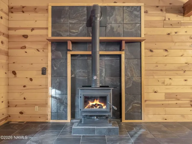 front view of a brick house with a large window