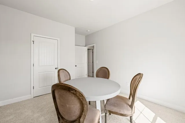 a bathroom with a toilet a sink and a mirror