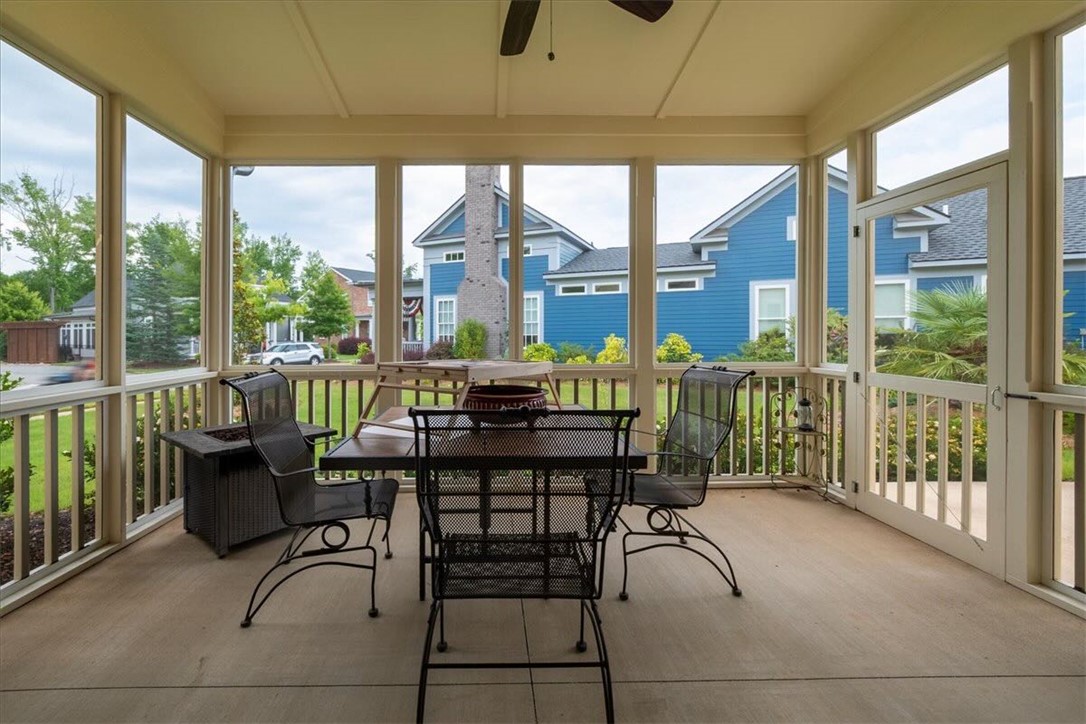 217 Pershing Avenue Clemson, SC 29631 - Photo 6 of 37 A tranquil screened porch offers an inviting outdoor retreat with views of the gorgeous landscaping and neighborhood.