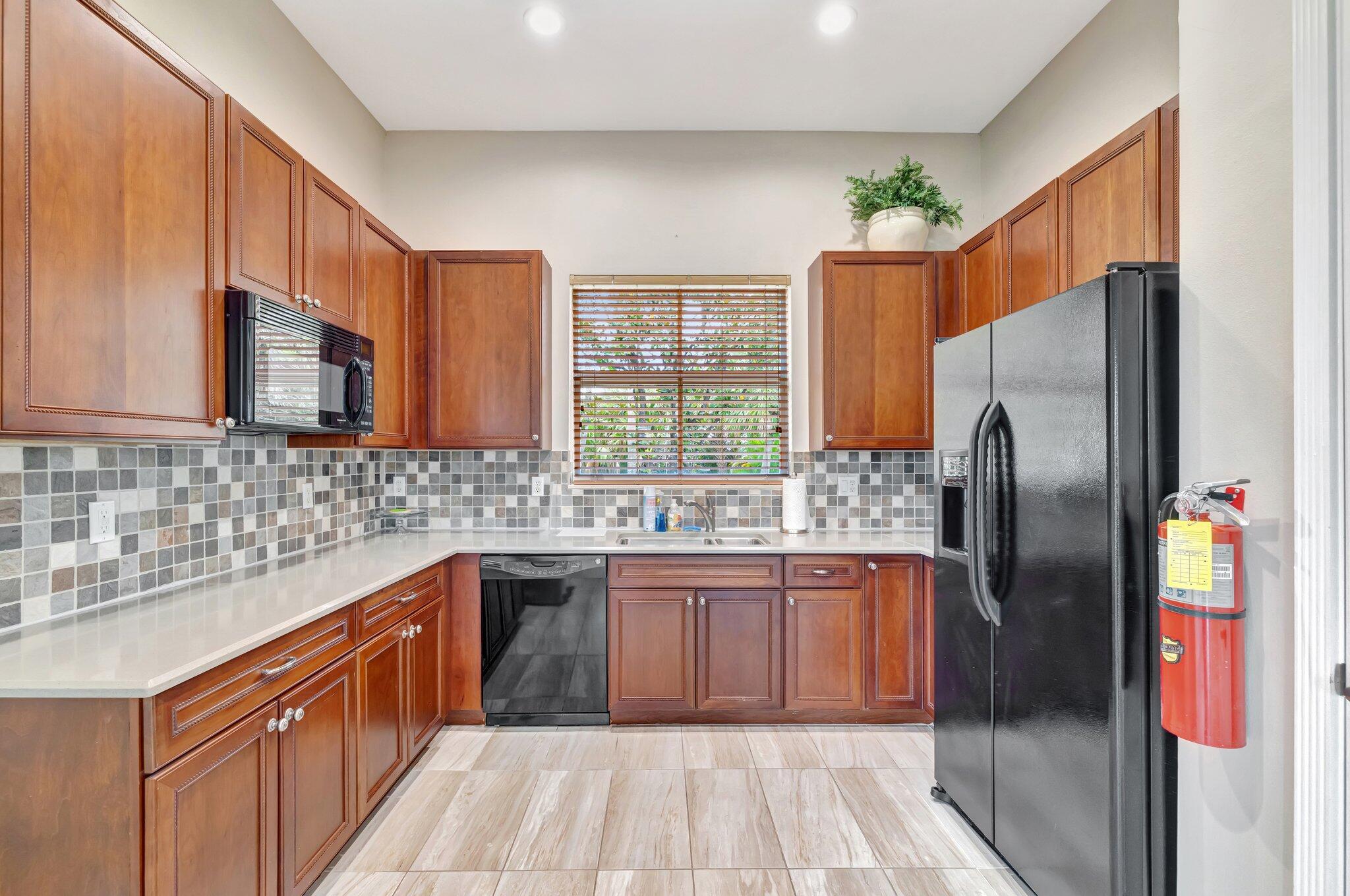 699 Southwest River Bend Circle Stuart, FL 34997 - Photo 59 of 78 Clubhouse Kitchen