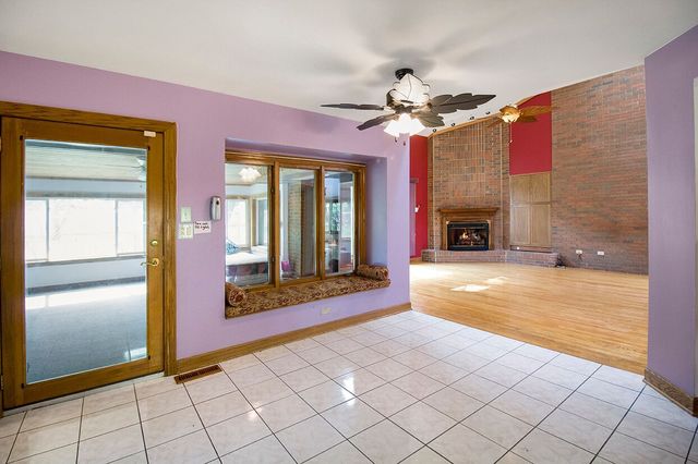 1901 East Burville Road Crete, IL 60417 - Photo 12 of 39 a view of a livingroom with a fireplace