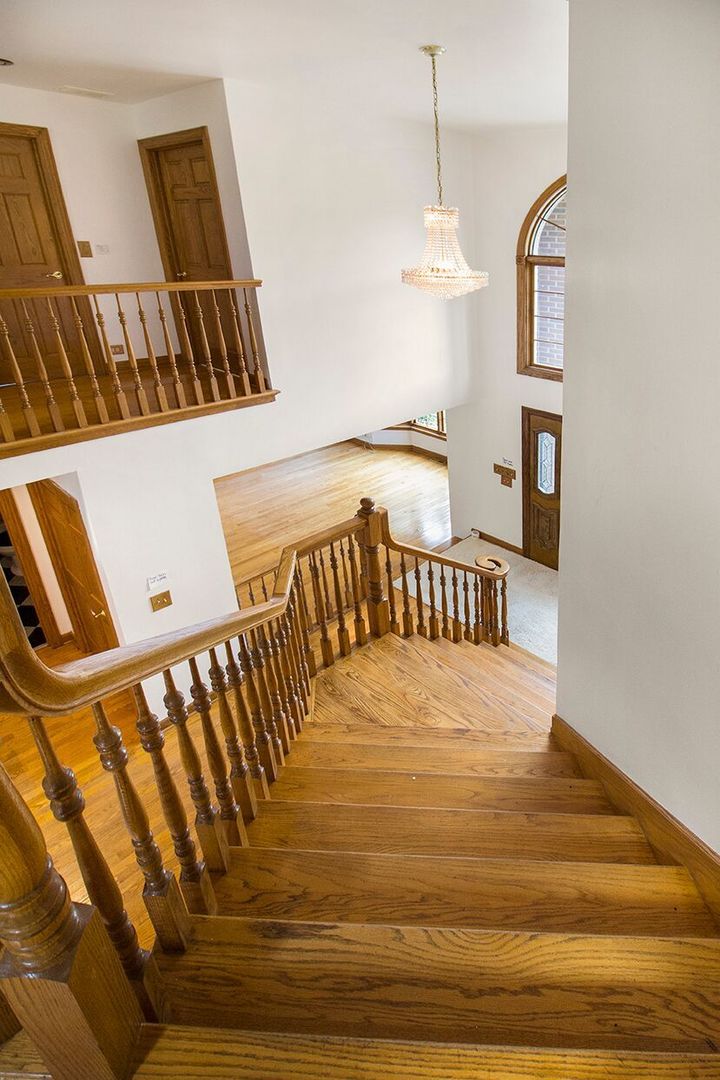 1901 East Burville Road Crete, IL 60417 - Photo 21 of 39 a view of stairs and hall with wooden floor