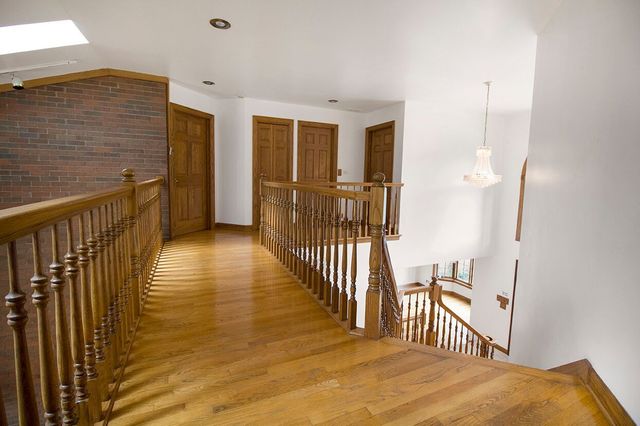 1901 East Burville Road Crete, IL 60417 - Photo 22 of 39 a view of a hallway with wooden floor