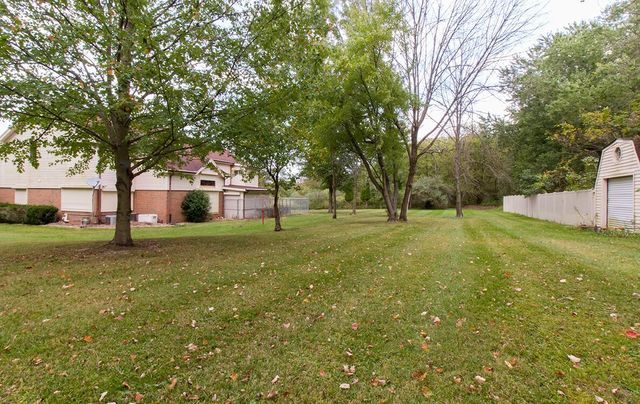 1901 East Burville Road Crete, IL 60417 - Photo 25 of 39 a view of a house with a yard