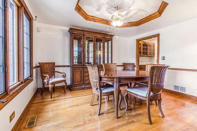 1901 East Burville Road Crete, IL 60417 - Photo 4 of 39 a view of a dining room with furniture window and wooden floor