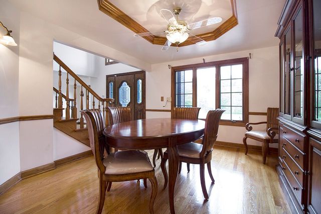 1901 East Burville Road Crete, IL 60417 - Photo 31 of 39 a view of a dining room with furniture window and wooden floor