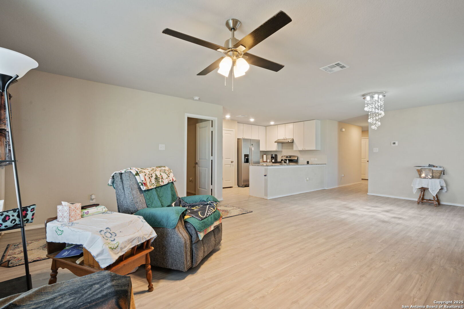 439 Agave Circle Jourdanton, TX 78026 - Photo 13 of 27 a living room with furniture and kitchen view