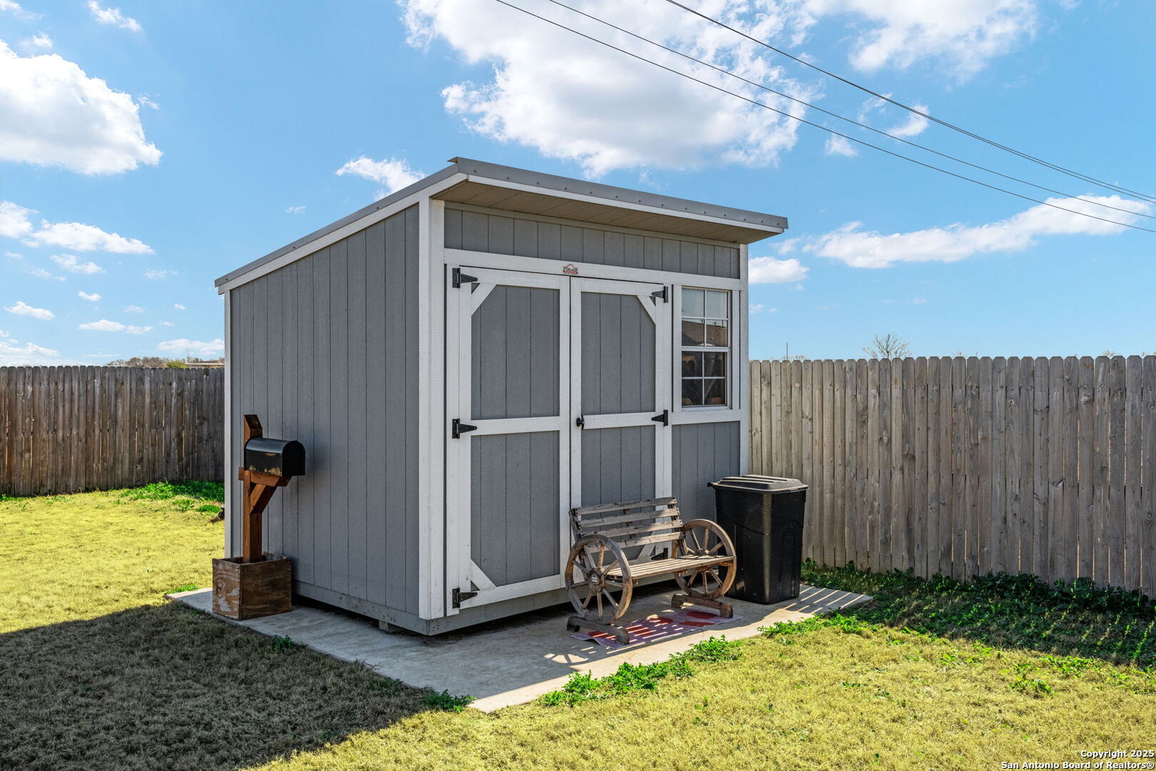 439 Agave Circle Jourdanton, TX 78026 - Photo 27 of 27 a view of a backyard with furniture and garden