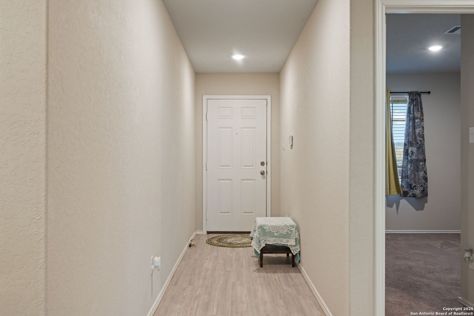 439 Agave Circle Jourdanton, TX 78026 - Photo 4 of 27 a view of a bathroom with a sink and a mirror