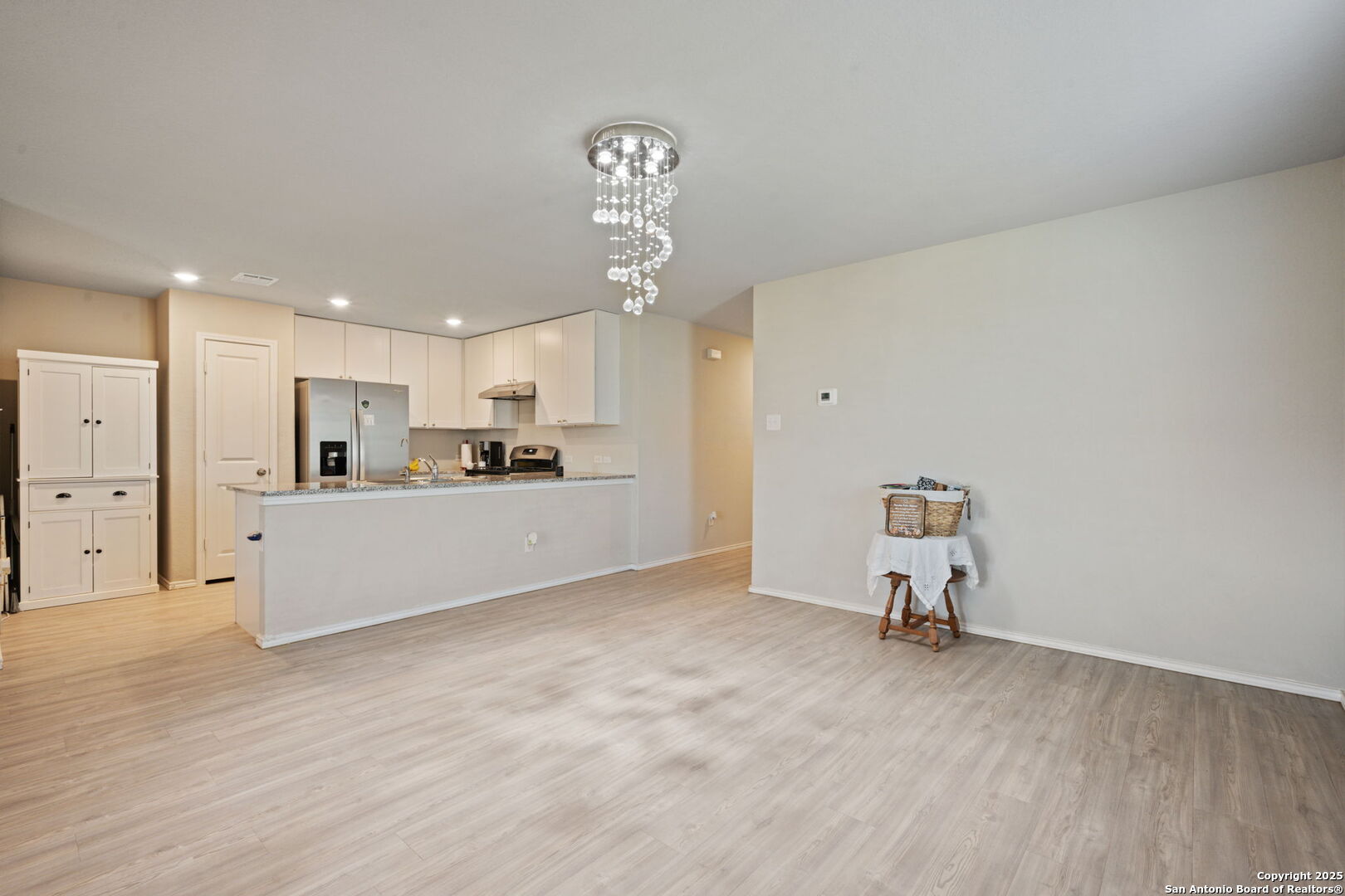 439 Agave Circle Jourdanton, TX 78026 - Photo 10 of 27 a view of kitchen with furniture and refrigerator