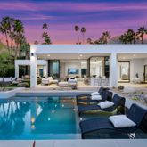 a view of a patio with couches table and chairs