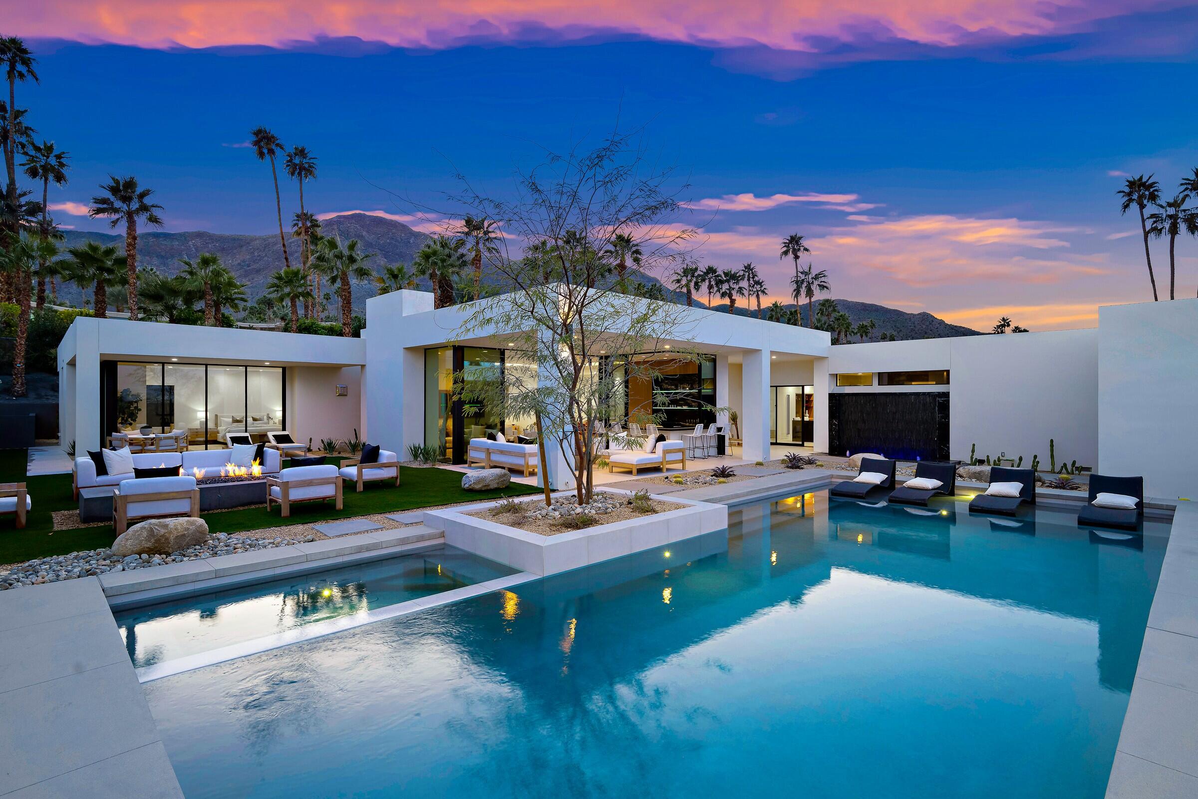70345 Pecos Road Rancho Mirage, CA 92270 - Photo 11 of 72 a view of a house with swimming pool and sitting area