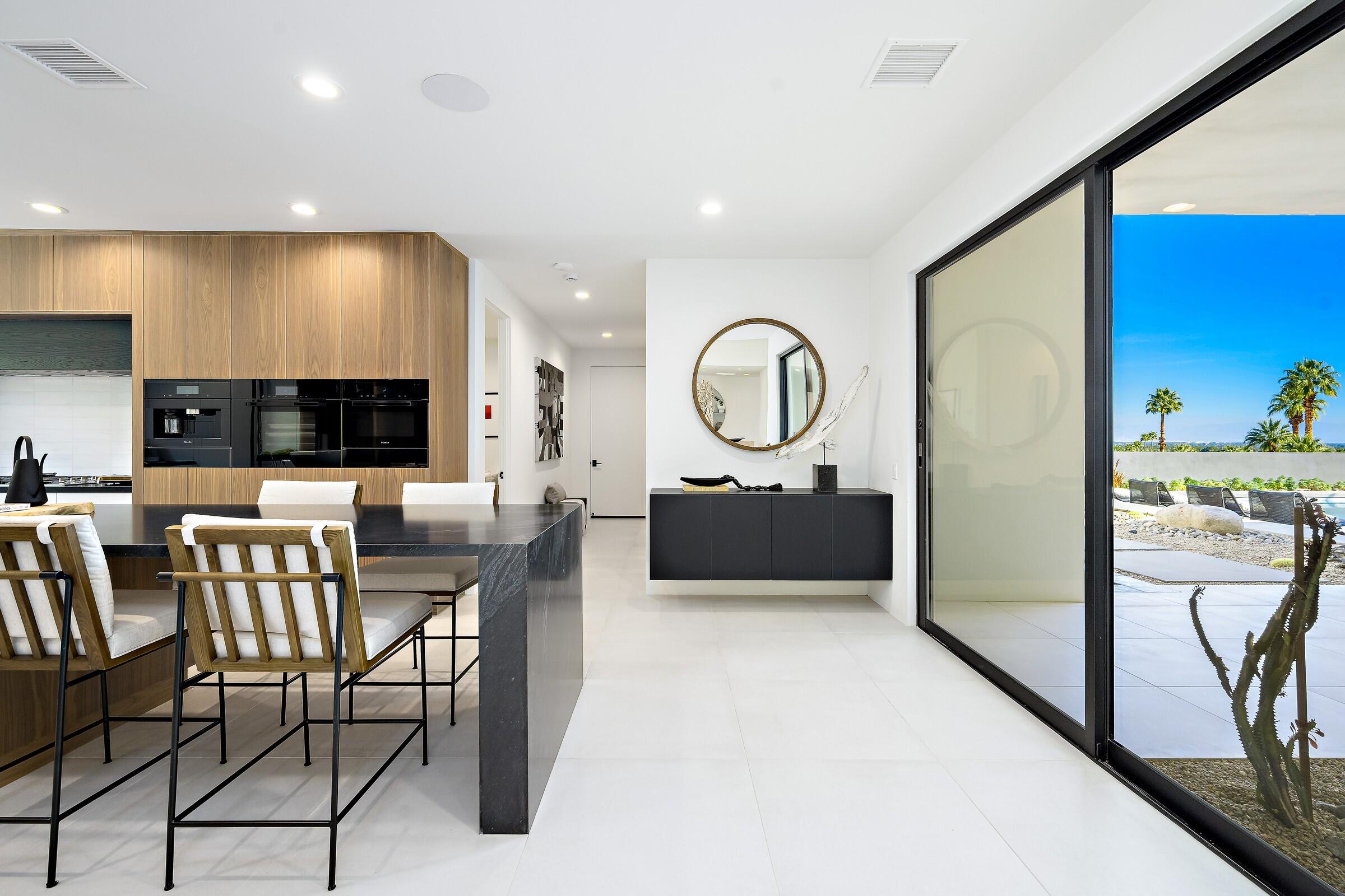 70345 Pecos Road Rancho Mirage, CA 92270 - Photo 37 of 72 a view of a kitchen with furniture and a window