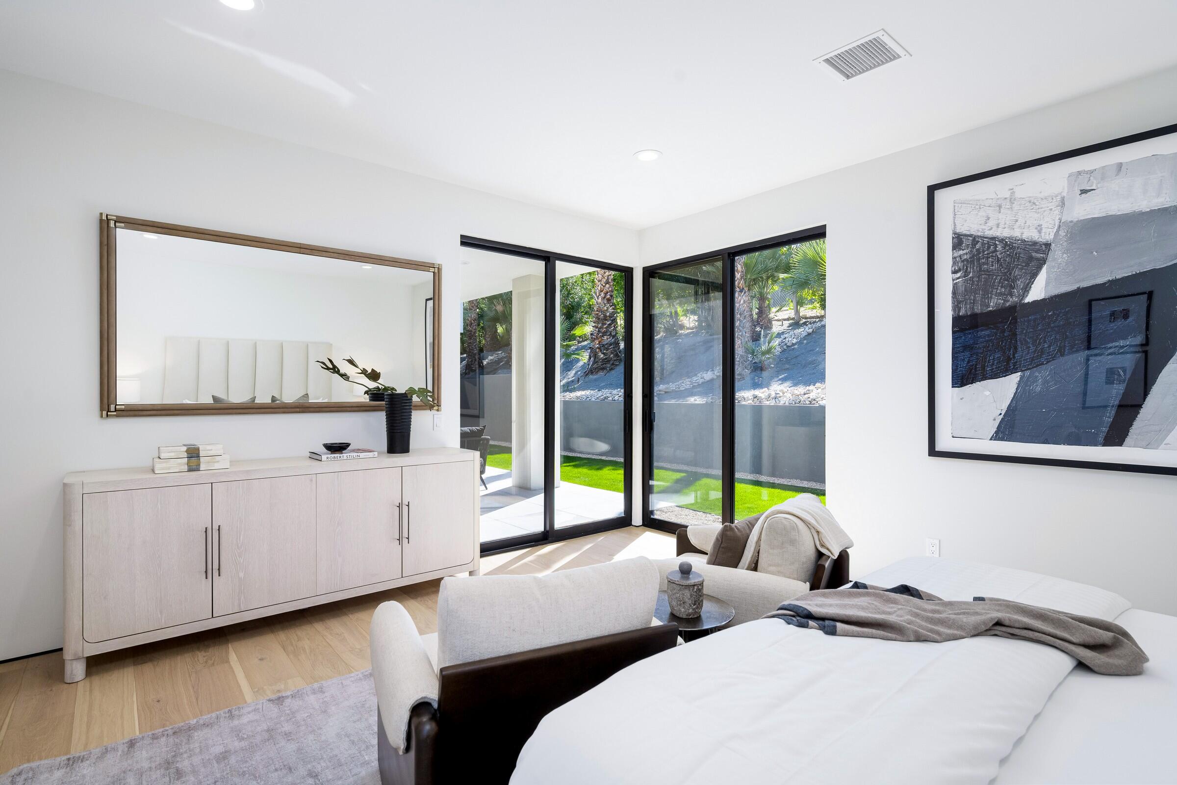 70345 Pecos Road Rancho Mirage, CA 92270 - Photo 55 of 72 a bedroom with two beds and large window
