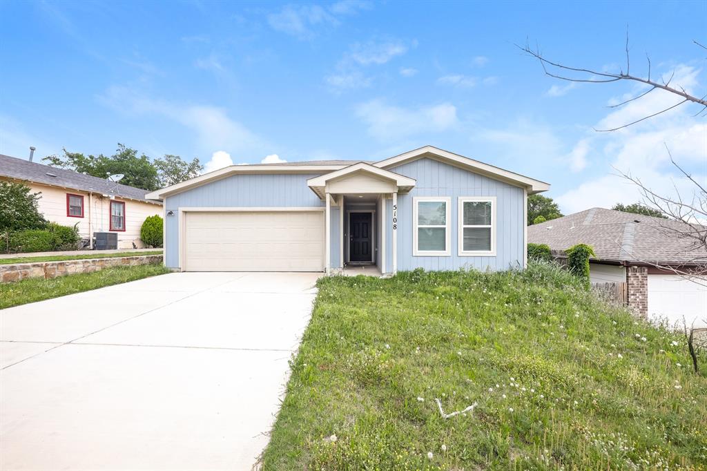 5108 Kilpatrick Avenue Fort Worth, TX 76107 - Photo 1 of 21 a front view of a house with a garden