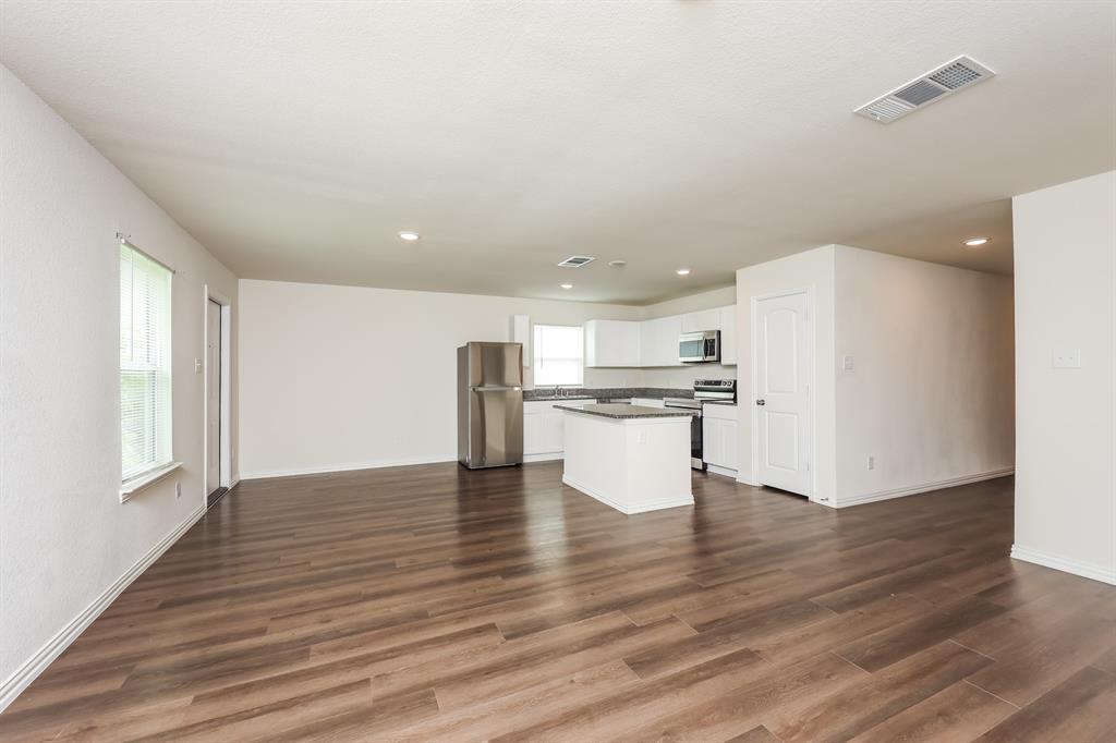 5108 Kilpatrick Avenue Fort Worth, TX 76107 - Photo 5 of 21 a view of kitchen with wooden floor