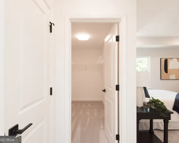a view of a bathroom from a hallway
