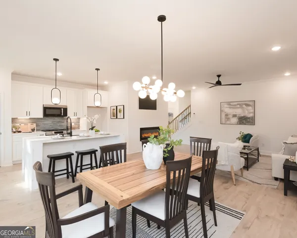 a view of a dining room and furniture