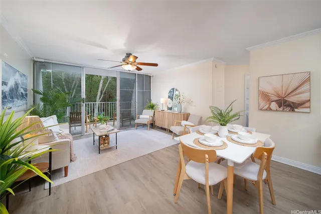 a view of a dining room with furniture window and outside view