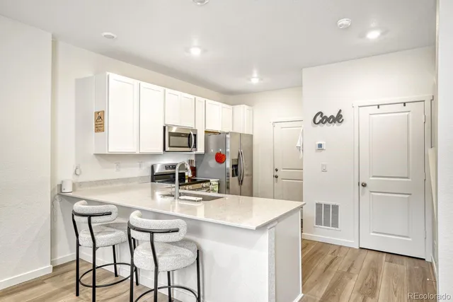 $475,000 | 14586 West 91st Avenue, Unit E, Arvada, CO 80005