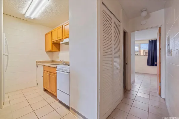 a view of a storage & utility room with washer and dryer