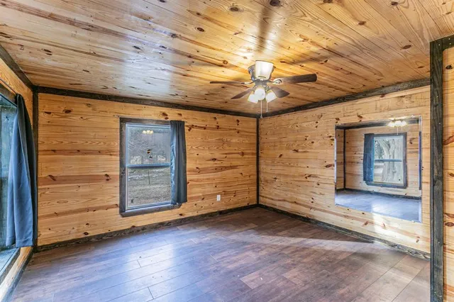 a view of a big room with wooden floors