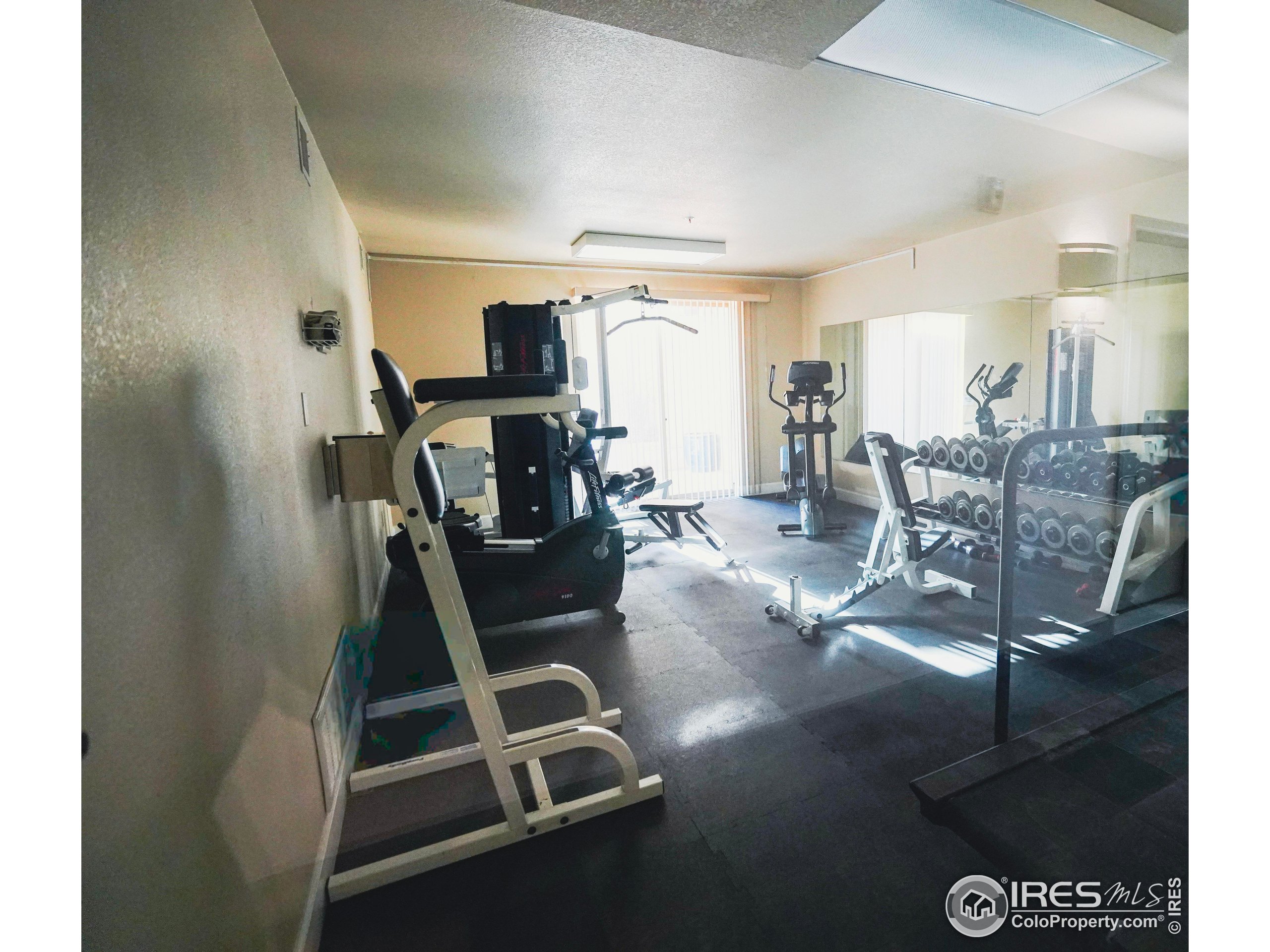 4500 Baseline Road, Unit 4104 Boulder, CO 80303 - Photo 13 of 14 a room with lots of gym equipment