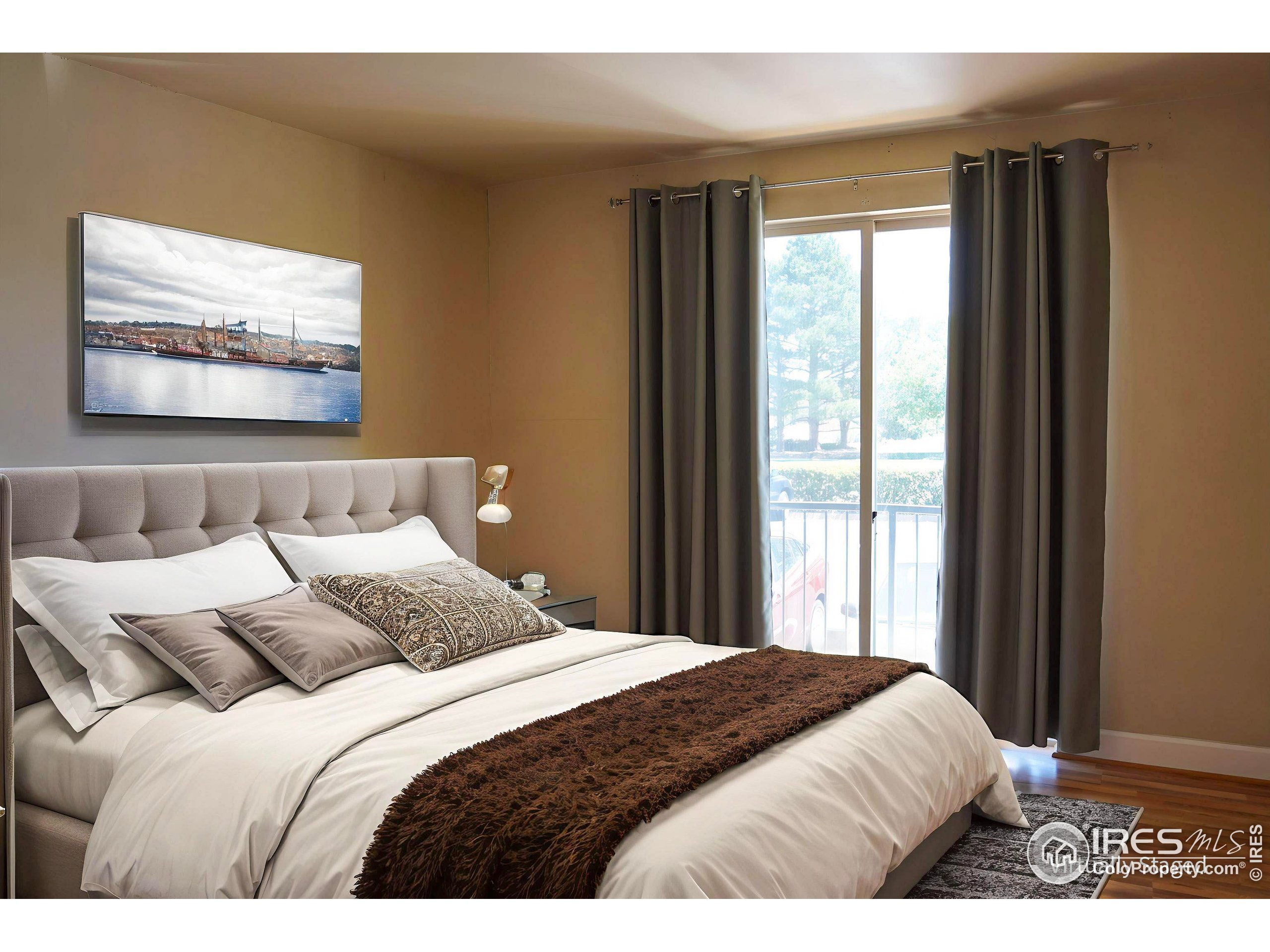 4500 Baseline Road, Unit 4104 Boulder, CO 80303 - Photo 6 of 14 a bedroom with a large bed and a window