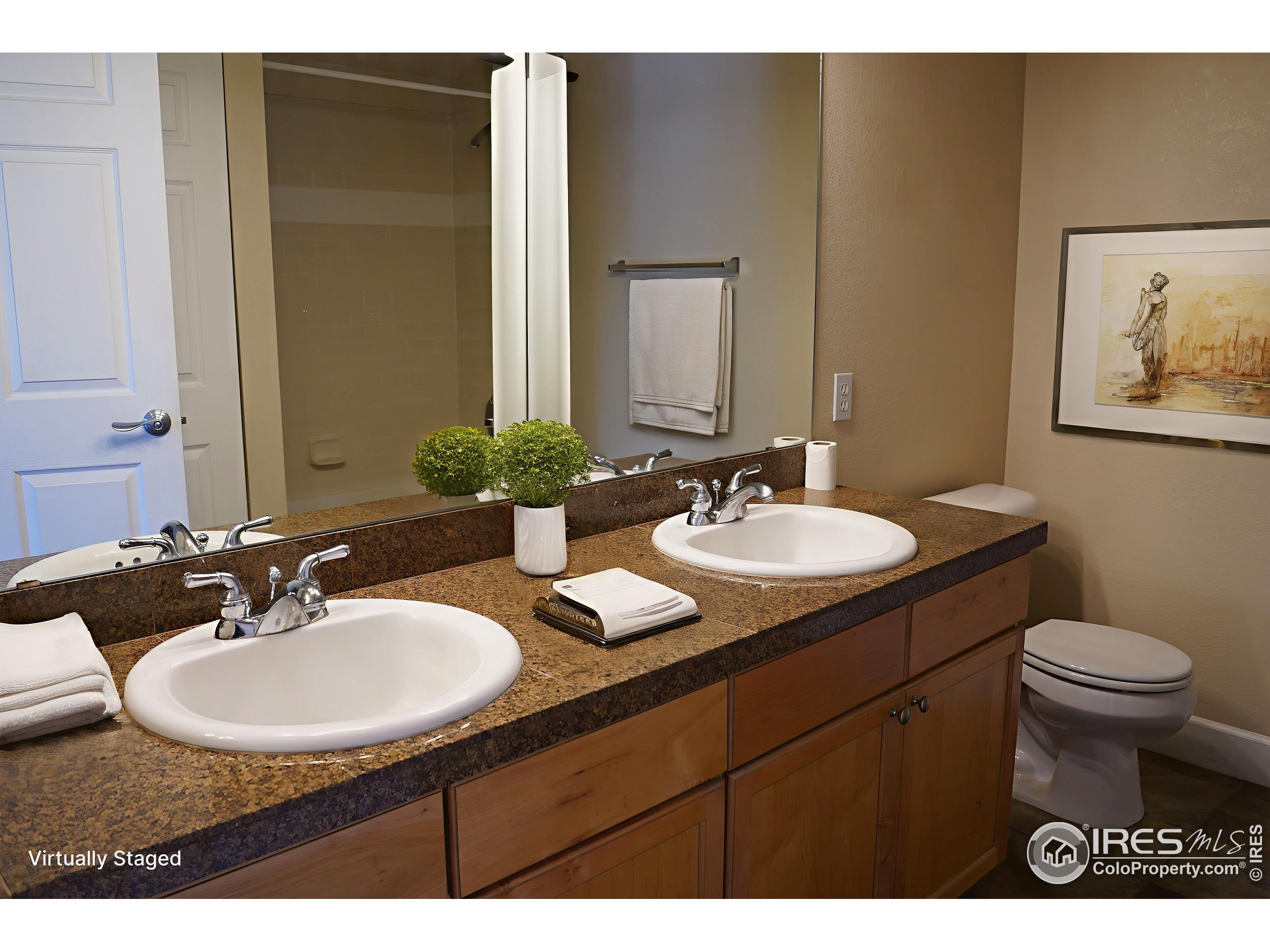 4500 Baseline Road, Unit 4104 Boulder, CO 80303 - Photo 7 of 14 a bathroom with a sink and a toilet