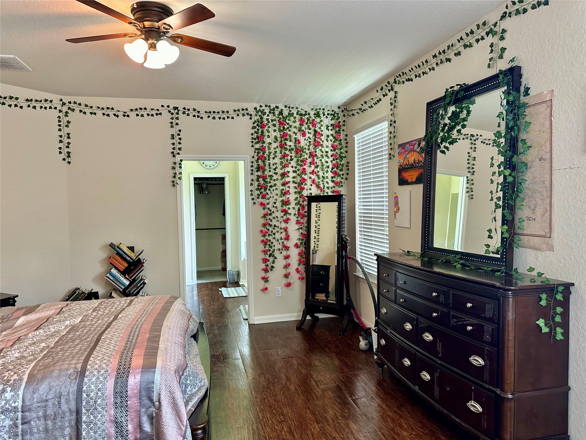 18622 Each Elm Way Houston, TX 77084 - Photo 13 of 35 a bedroom with a bed and a dresser
