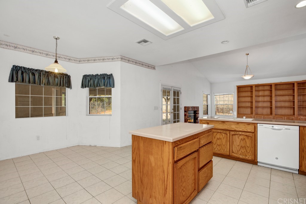 792 Gloucester Lane Thousand Oaks, CA 91362 - Photo 14 of 66 a kitchen with stainless steel appliances a sink stove and cabinets
