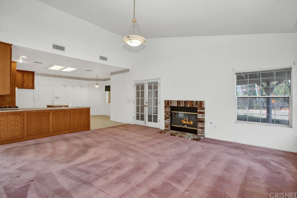 792 Gloucester Lane Thousand Oaks, CA 91362 - Photo 18 of 66 a living room with furniture and a flat screen tv