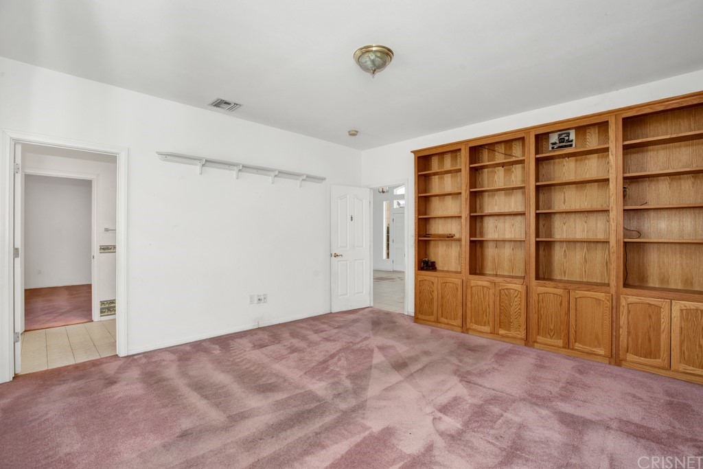 792 Gloucester Lane Thousand Oaks, CA 91362 - Photo 19 of 66 a view of empty room with wooden floor and fan