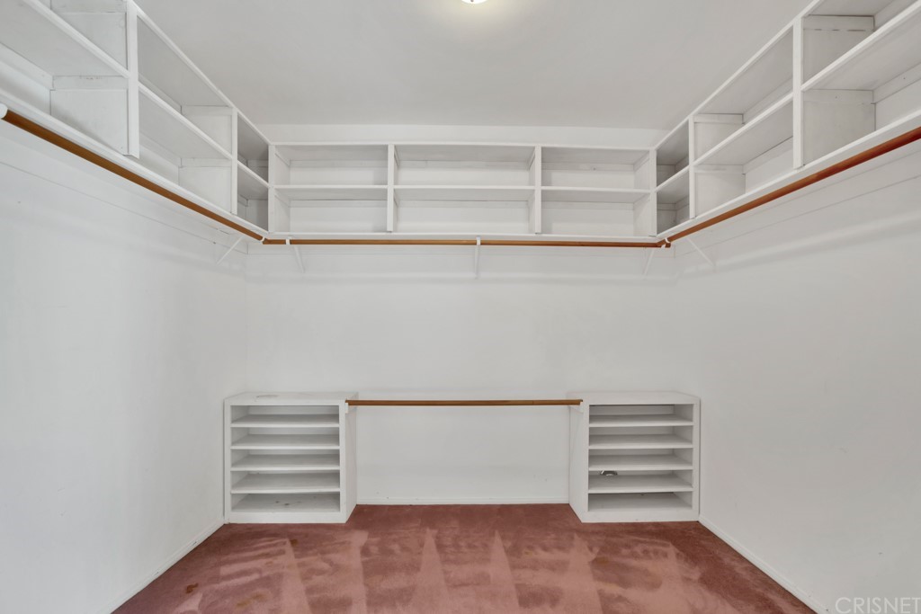 792 Gloucester Lane Thousand Oaks, CA 91362 - Photo 29 of 66 a view of walk in closet with empty racks