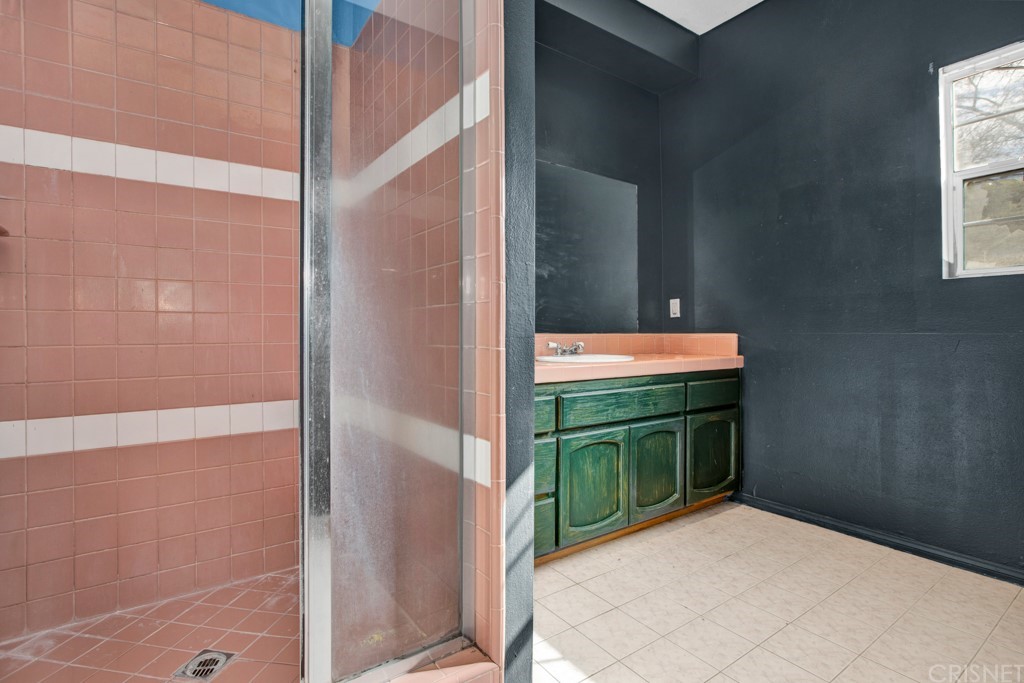 792 Gloucester Lane Thousand Oaks, CA 91362 - Photo 33 of 66 a bathroom with a sink and a mirror