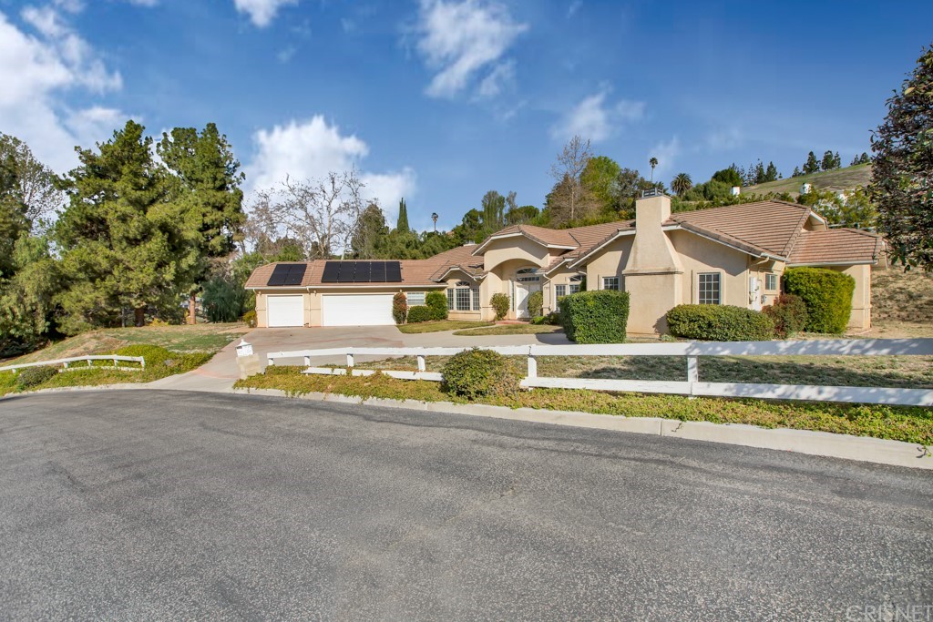 792 Gloucester Lane Thousand Oaks, CA 91362 - Photo 46 of 66 a view of a house with swimming pool and a yard