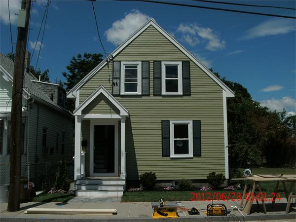 78 Taylor Street Boston, MA 02122 - Photo 1 of 13 a view of a house with a yard